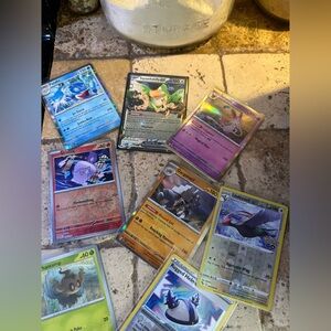 🔥🔥 Lot of 50 cards 14 reverse holo! In sleeves excellent lot AND BINDER!